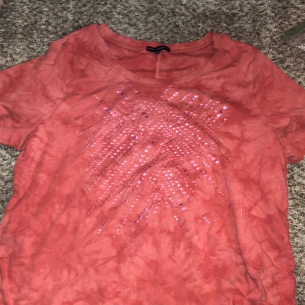 This is a tie-dyed women's shirt it is in good condition.